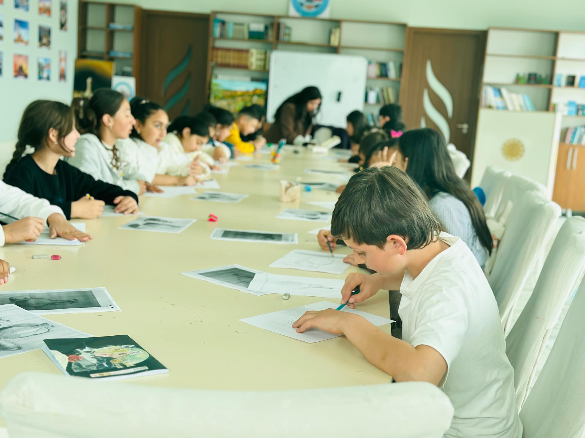 Drawing lesson and movie hour at the "SARAL Development and Education Center"