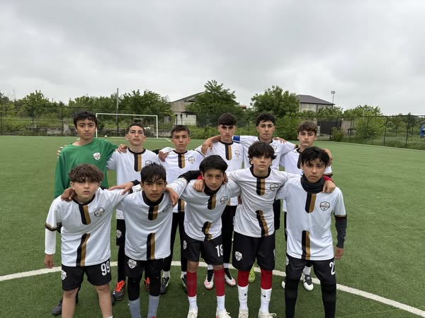 A friendly match was held between "Olimp" amateur football club and "Kur" football club