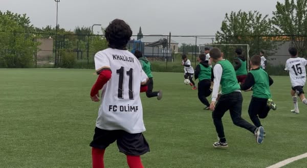 A friendly match was held between "Olimp" amateur football club and "Kur" football club