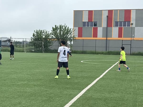 A friendly match was held between "Olimp" amateur football club and "Kur" football club