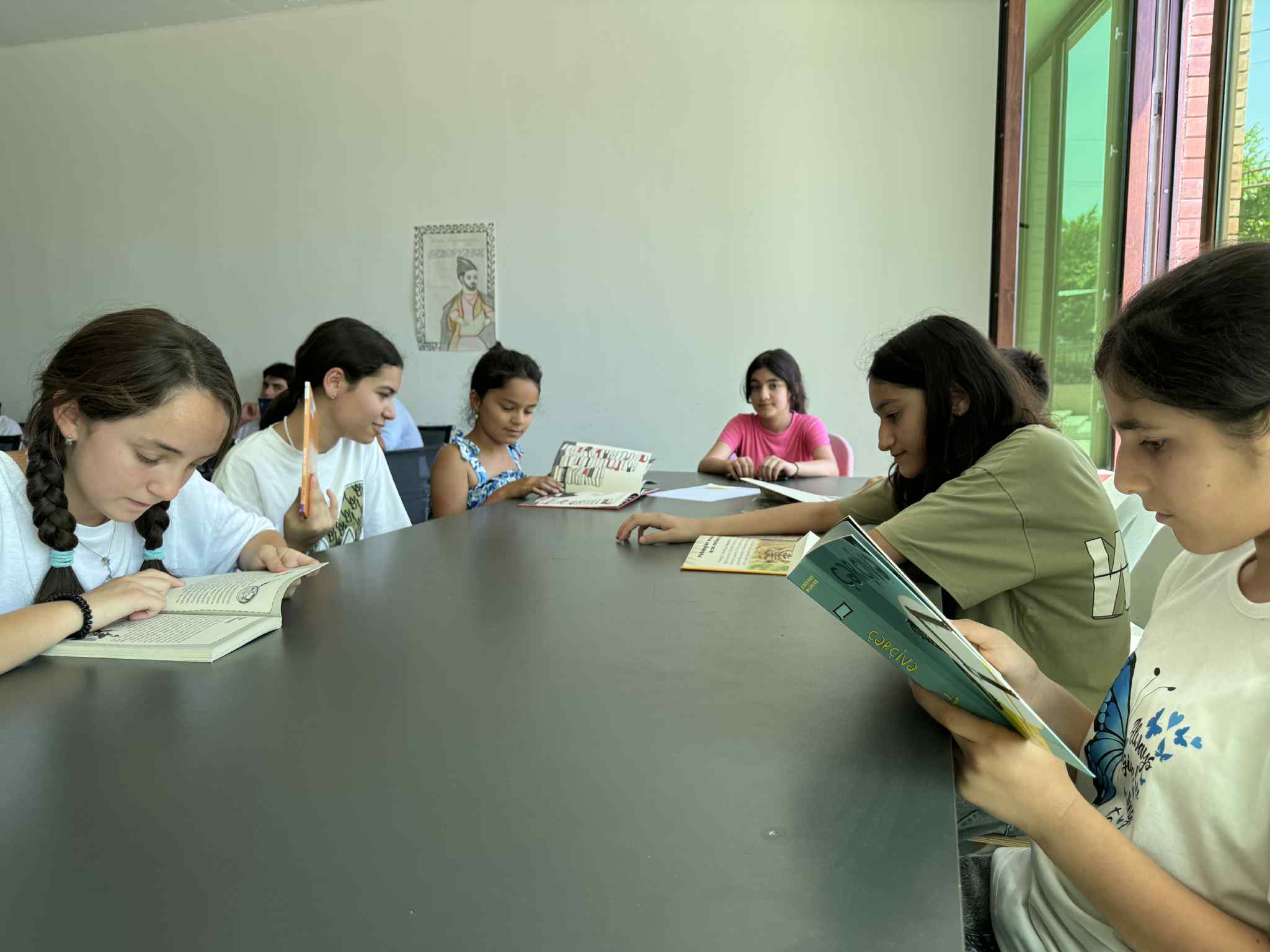 ADA University donated books to "SARAL Development and Education Center"