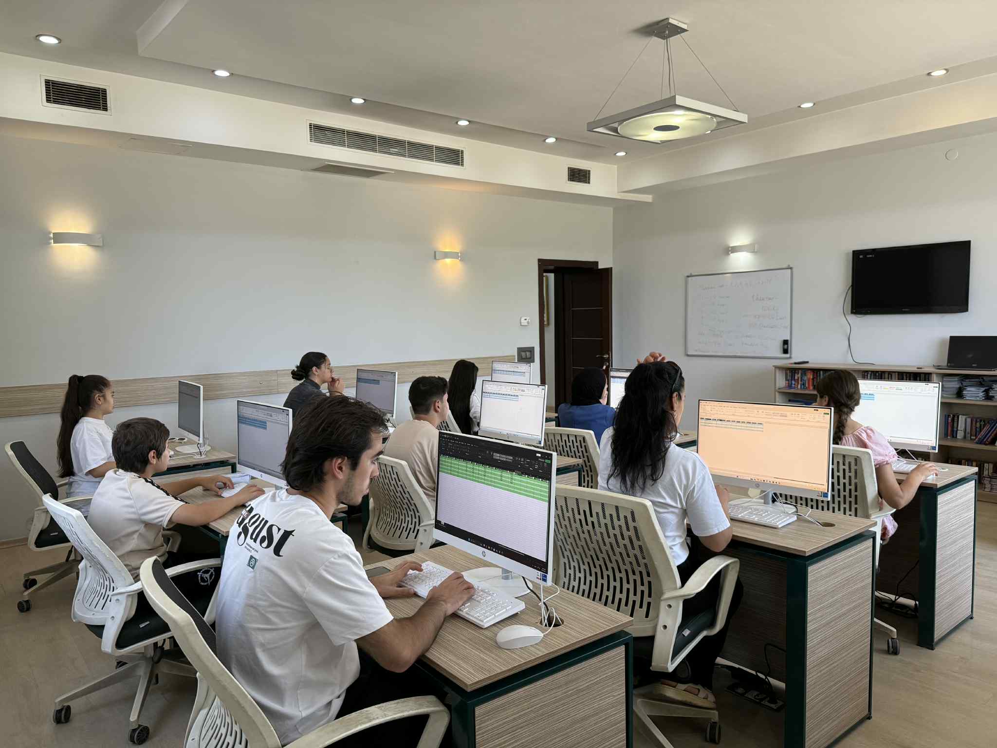 The final certification exam for computer course members took place at "Tea House"