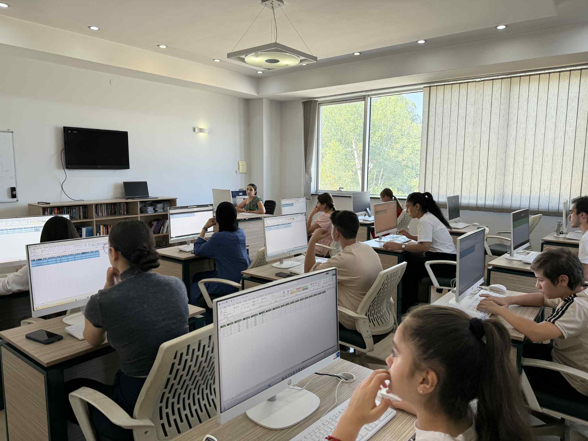 The final certification exam for computer course members took place at "Tea House"