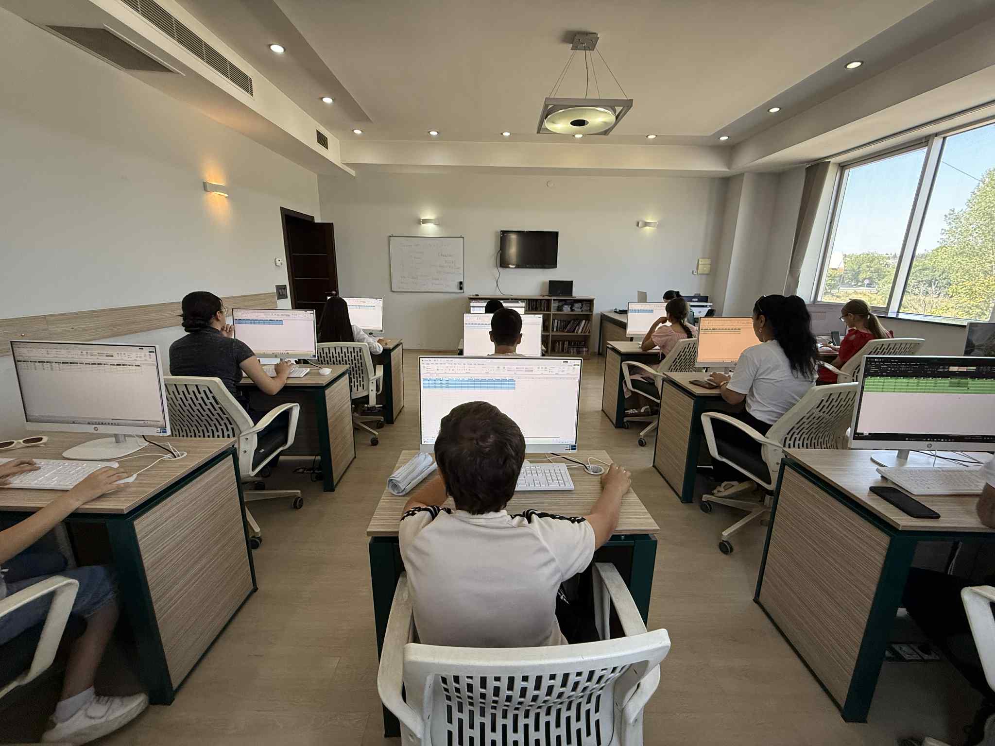 The final certification exam for computer course members took place at "Tea House"