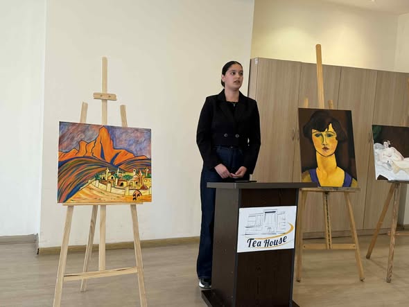 At the Tea House, future artists made presentations to their parents