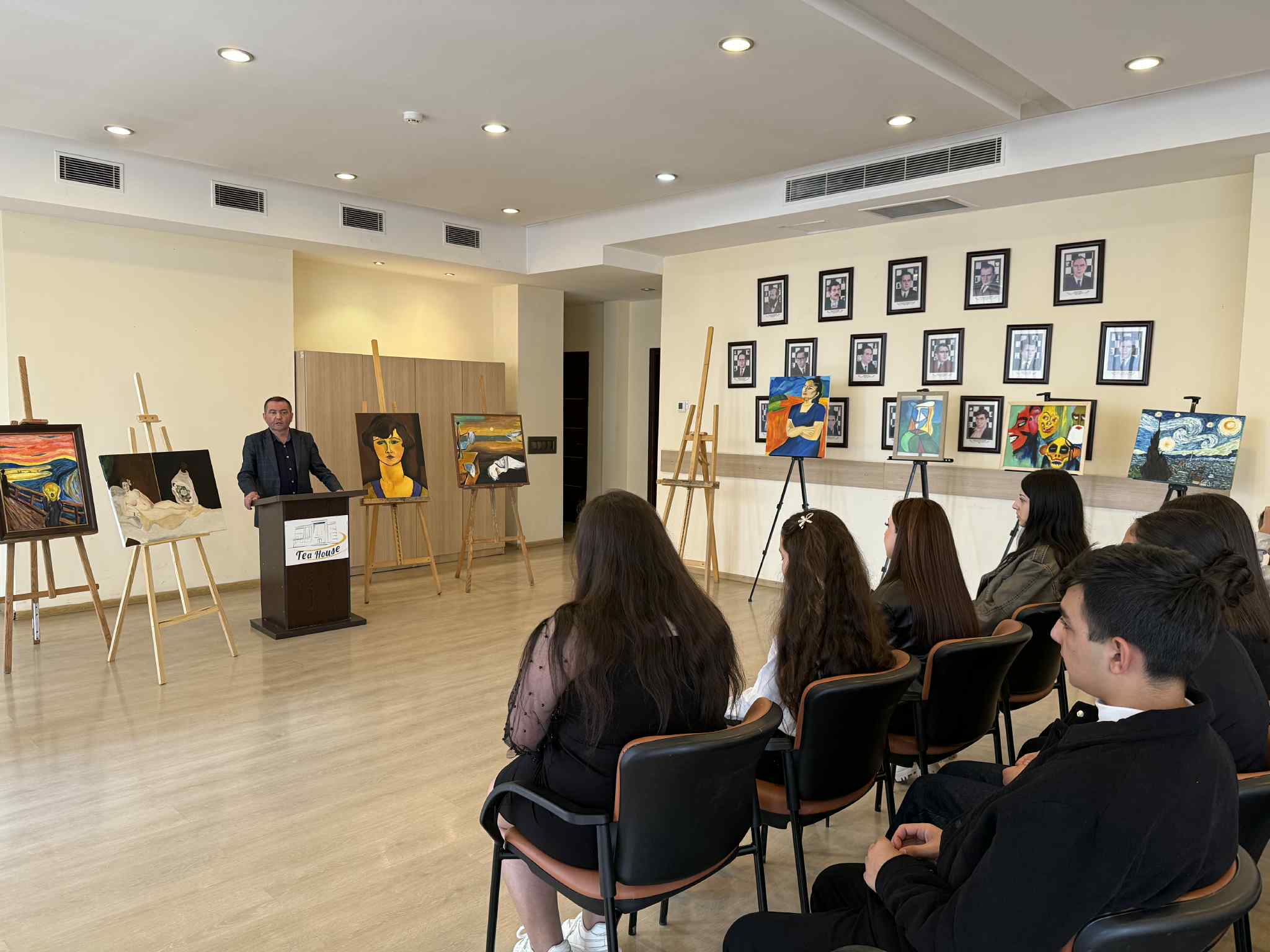 At the Tea House, future artists made presentations to their parents