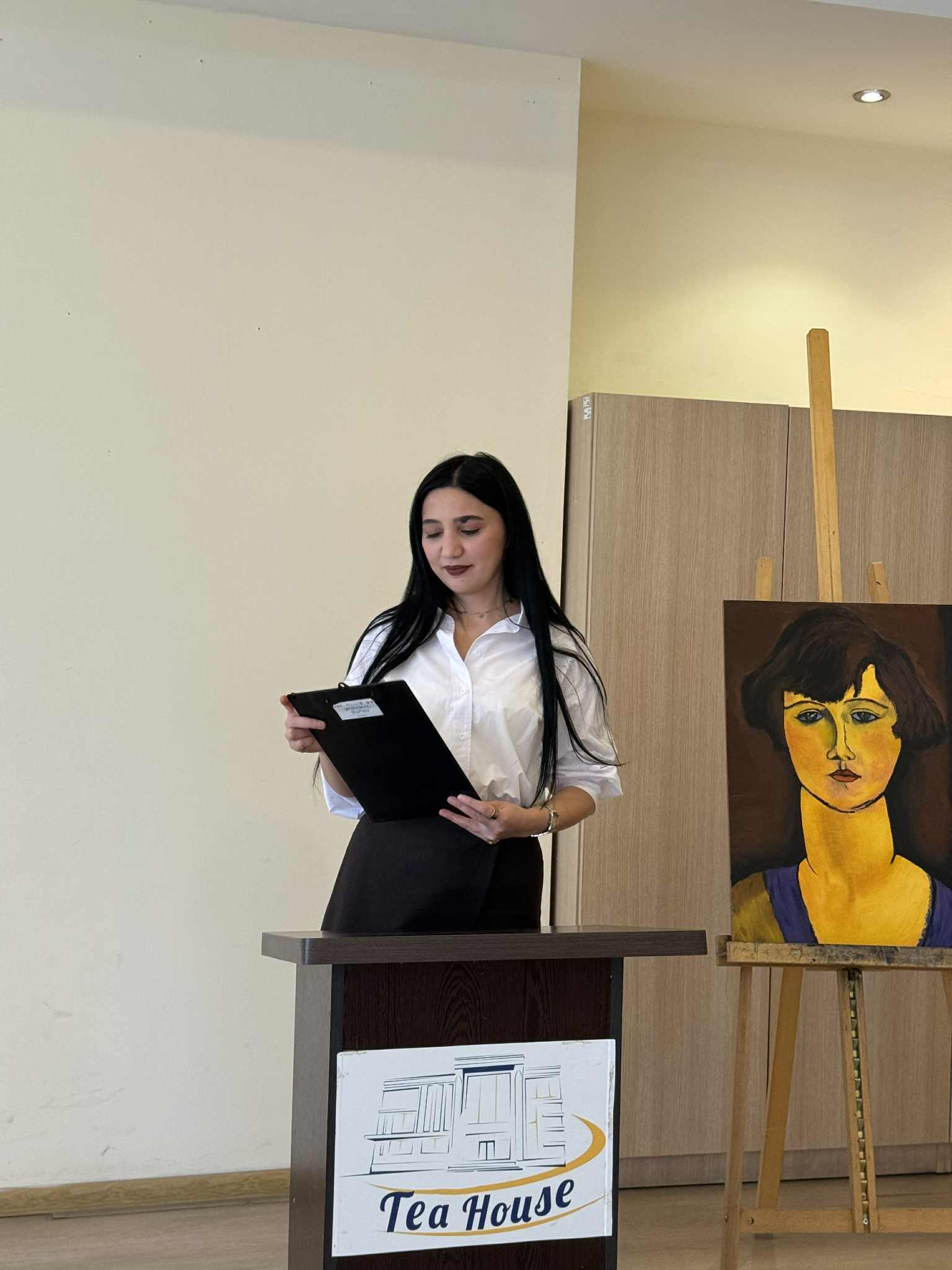 At the Tea House, future artists made presentations to their parents