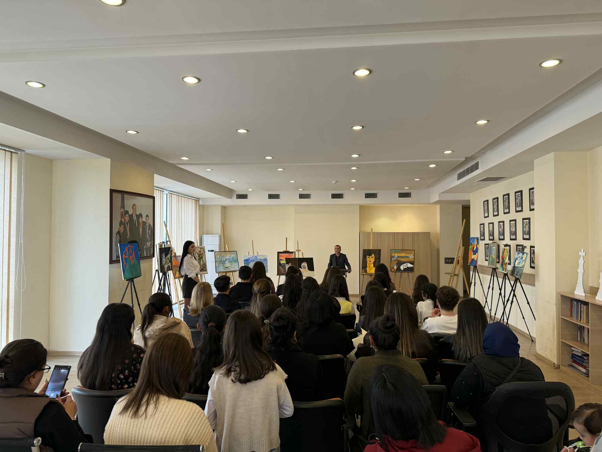 At the Tea House, future artists made presentations to their parents