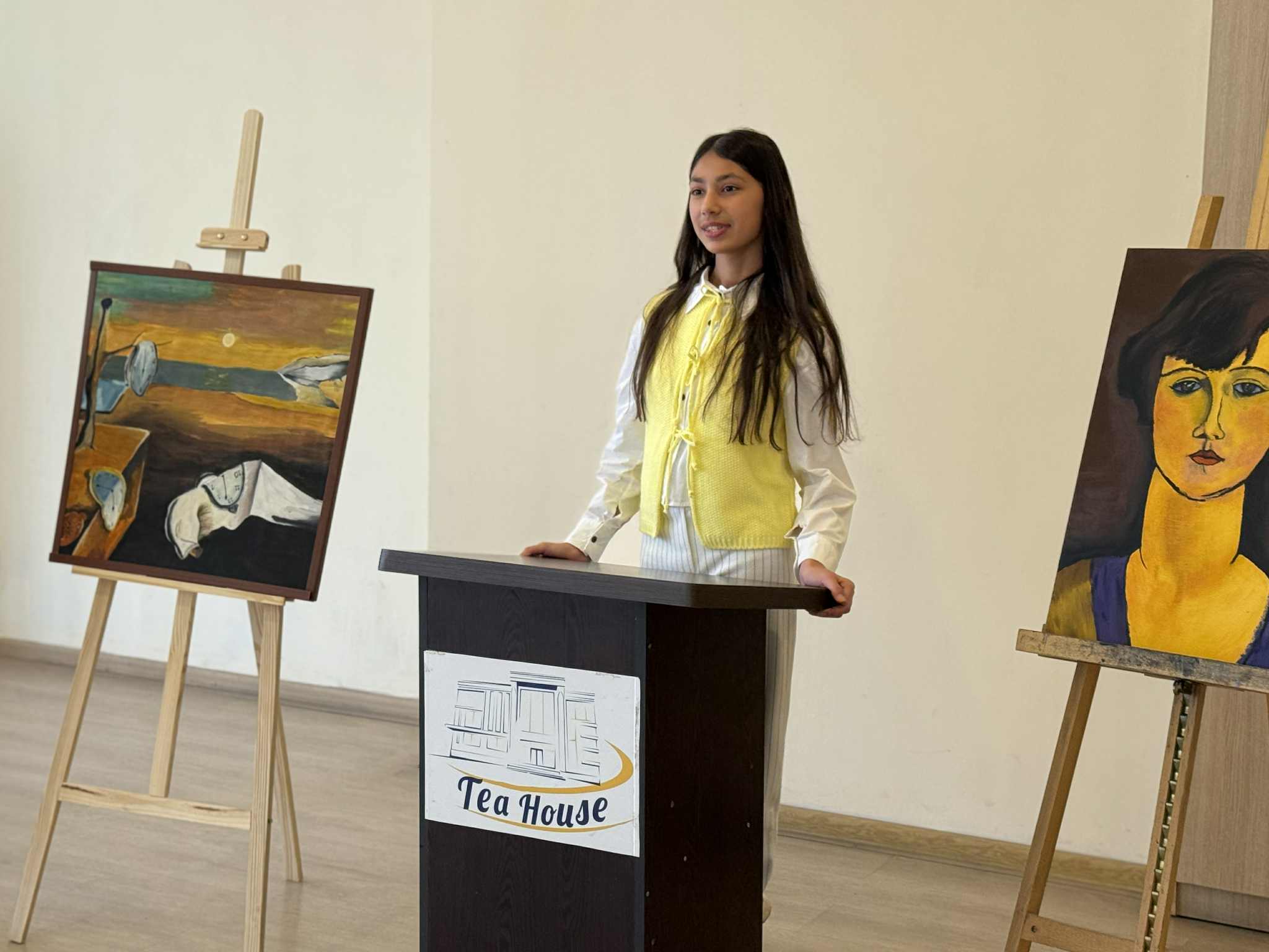 At the Tea House, future artists made presentations to their parents