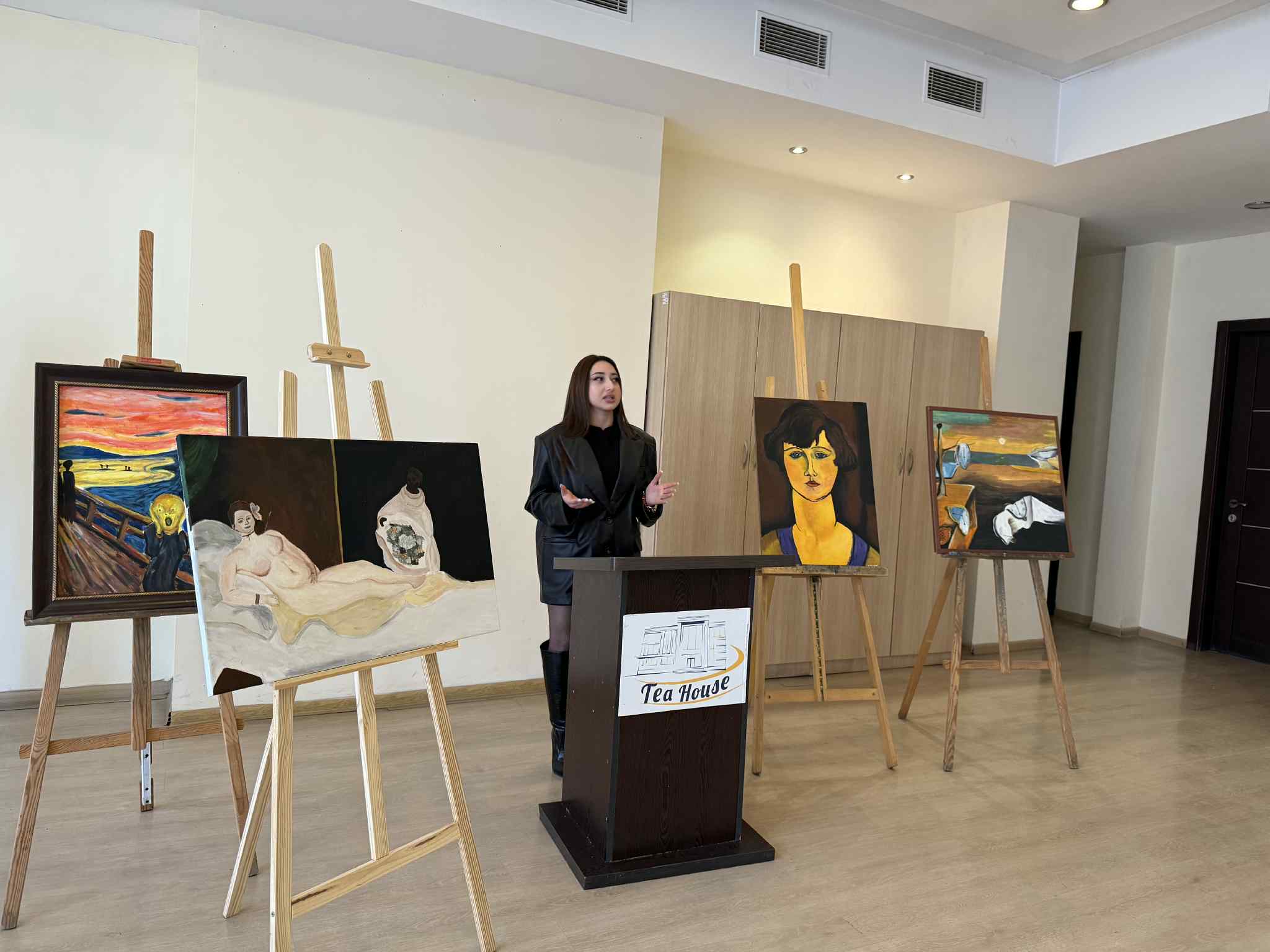 At the Tea House, future artists made presentations to their parents