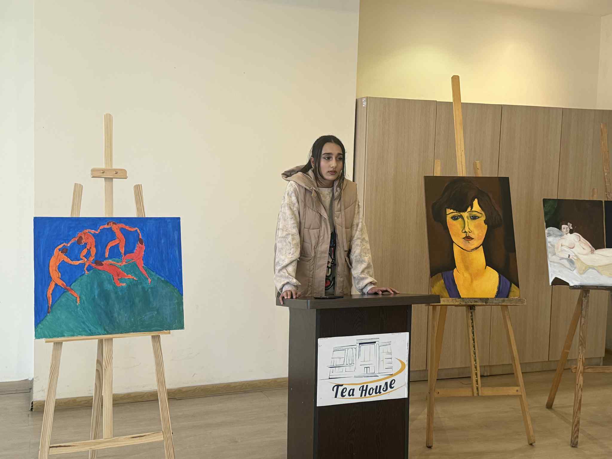 At the Tea House, future artists made presentations to their parents