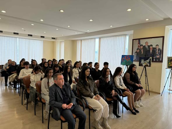 At the Tea House, future artists made presentations to their parents