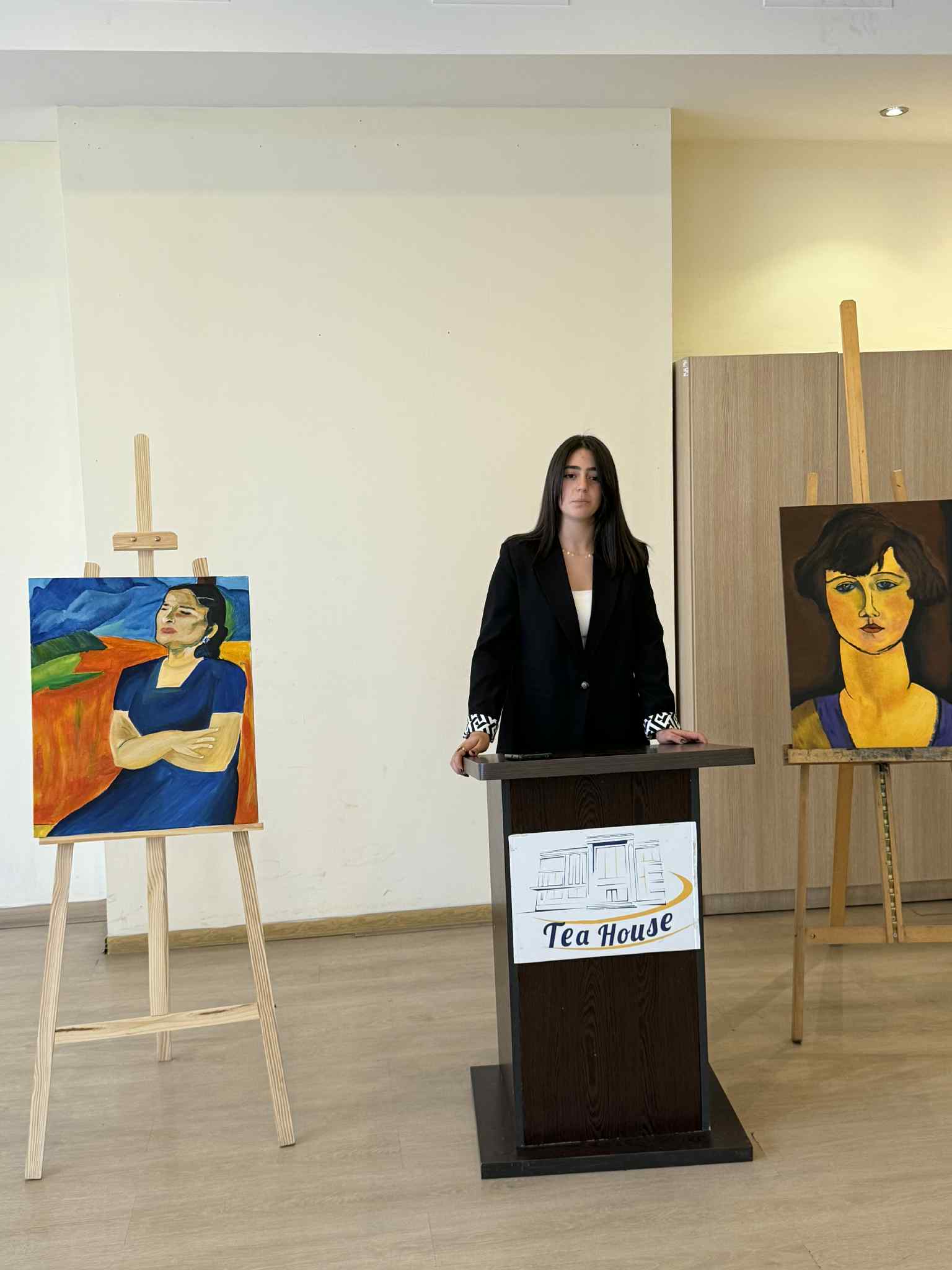 At the Tea House, future artists made presentations to their parents