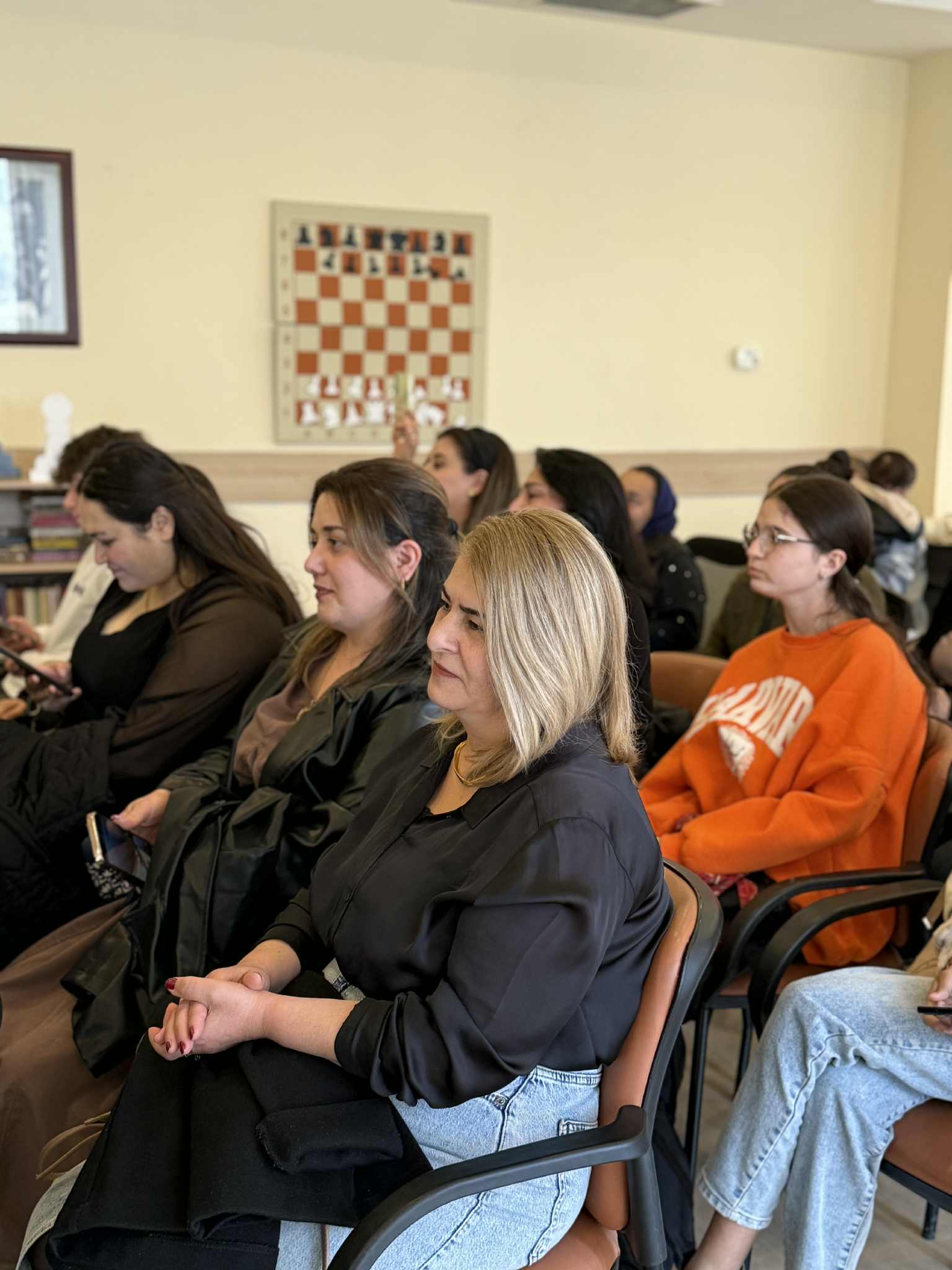 At the Tea House, future artists made presentations to their parents