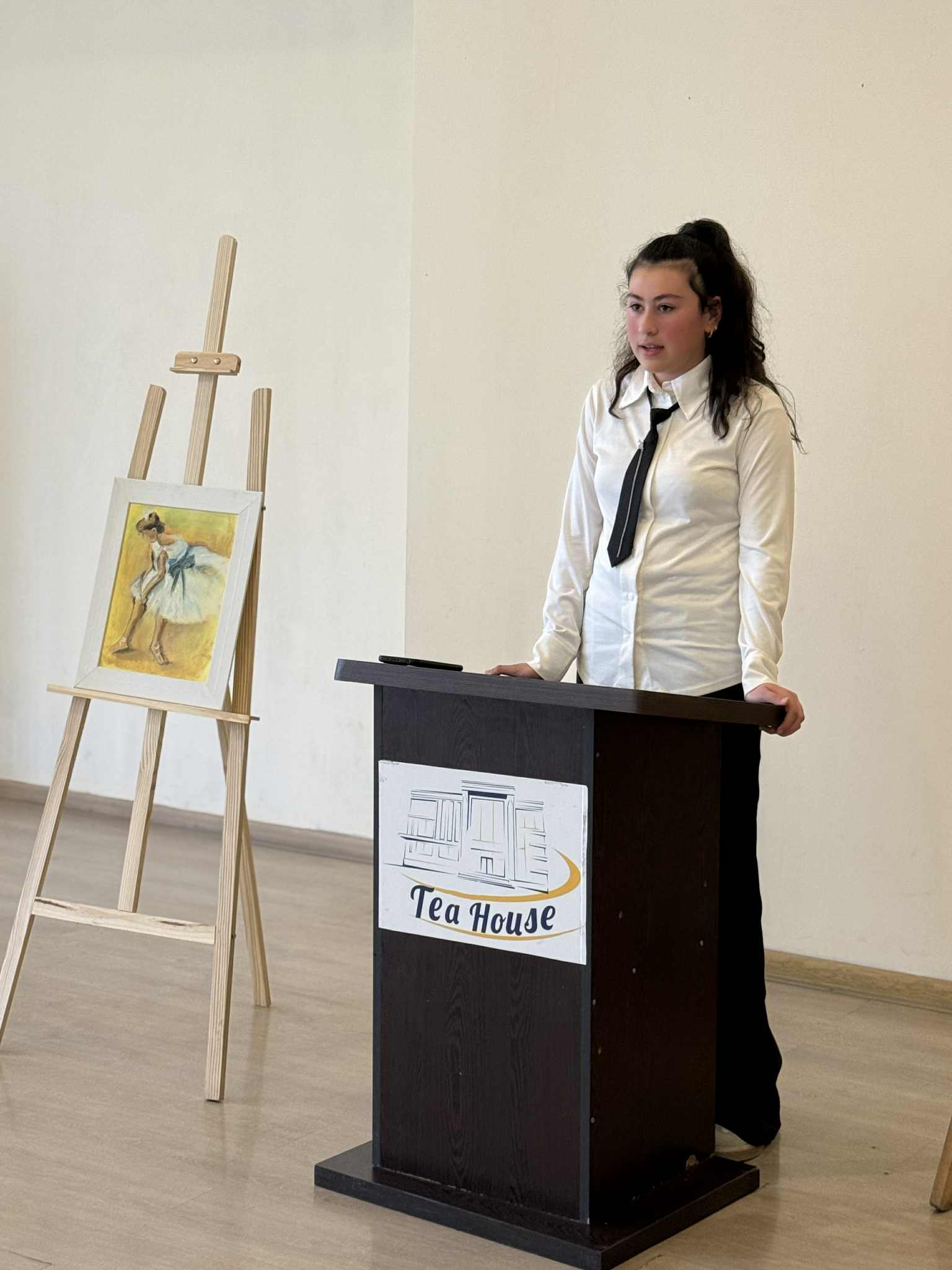 At the Tea House, future artists made presentations to their parents