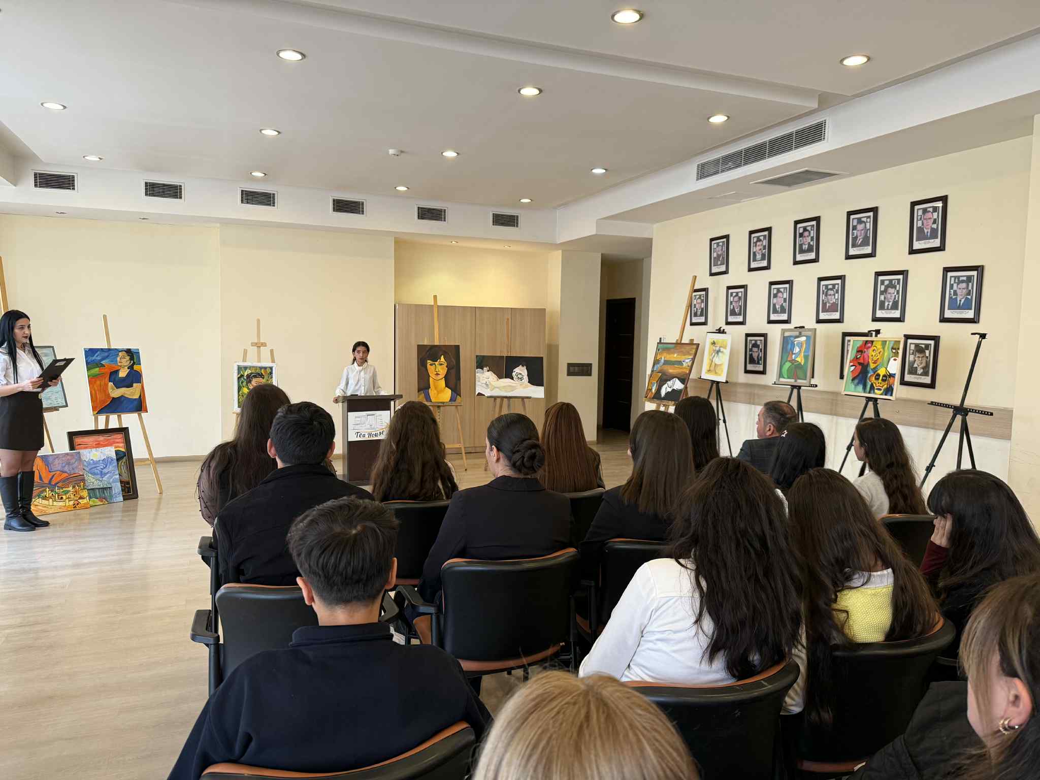 At the Tea House, future artists made presentations to their parents