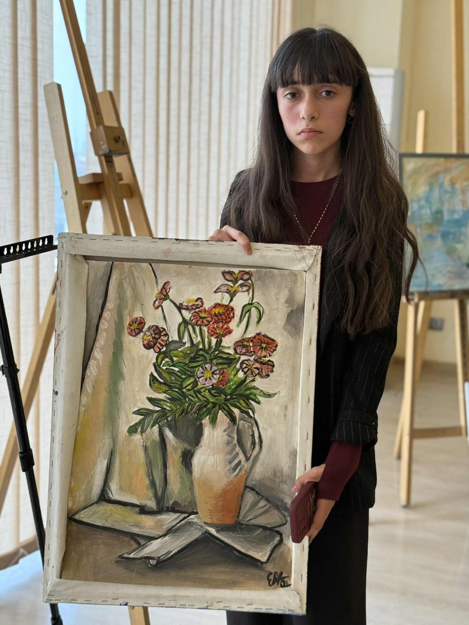 At the Tea House, future artists made presentations to their parents