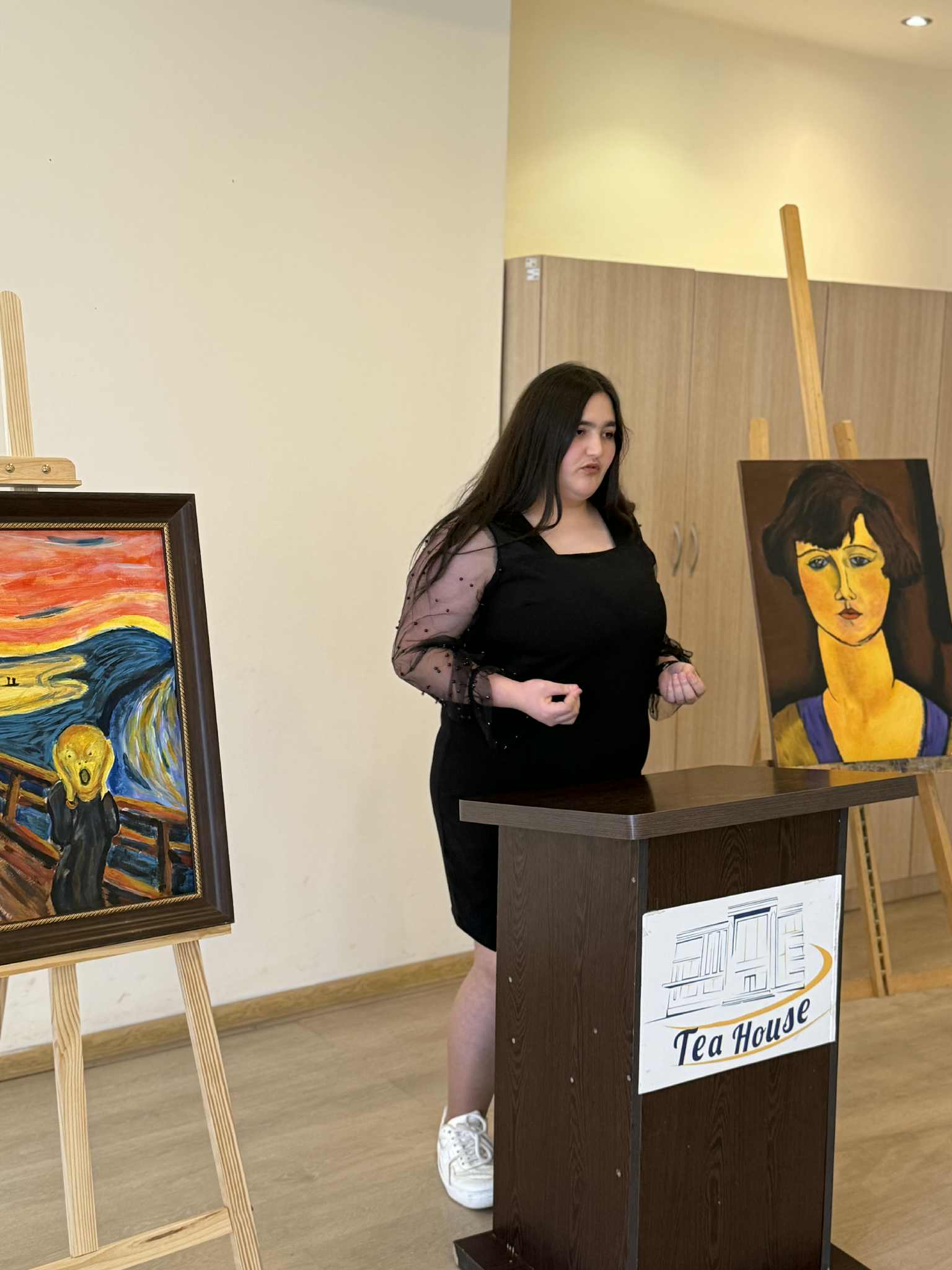 At the Tea House, future artists made presentations to their parents