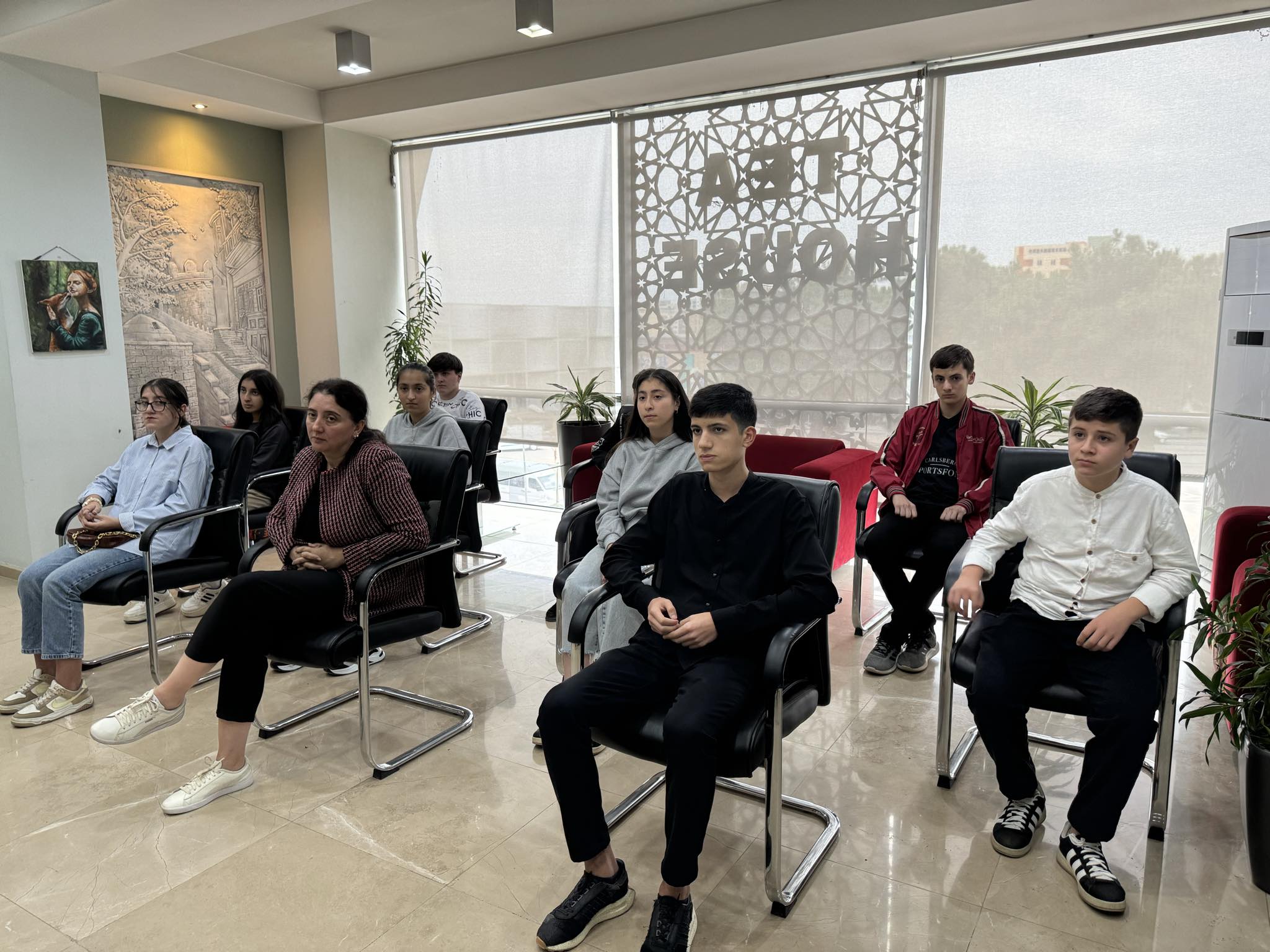 Presentations by computer course members at the Tea House